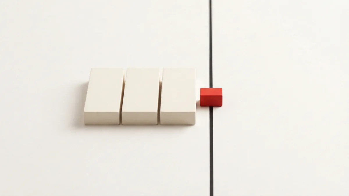 Geometric blocks crossing a threshold to represent VAT registration duties