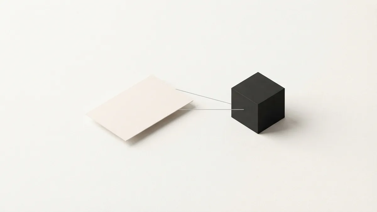 How a business ID can identify an entity A cream card and charcoal block linked by fine lines to represent a business identifier