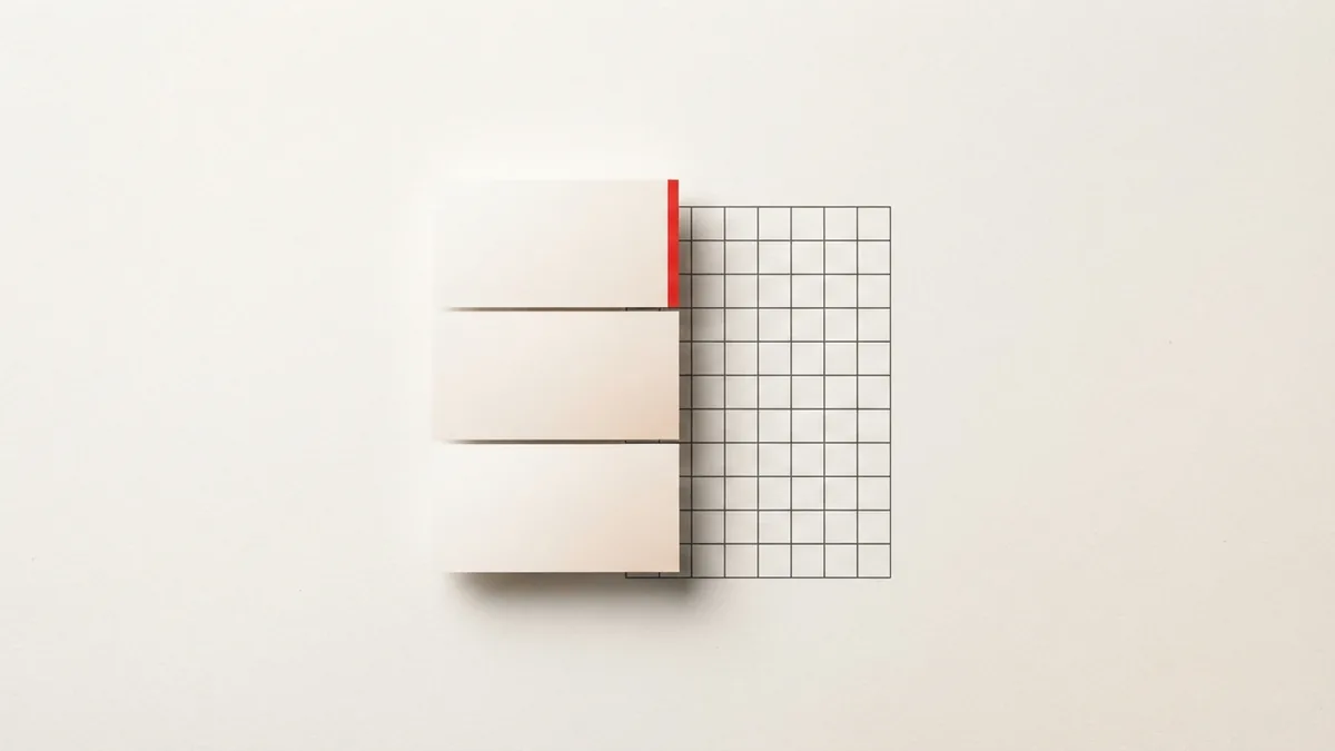 Organized VAT records and compliance Stacked matte cards and a precise grid representing VAT records and tax compliance